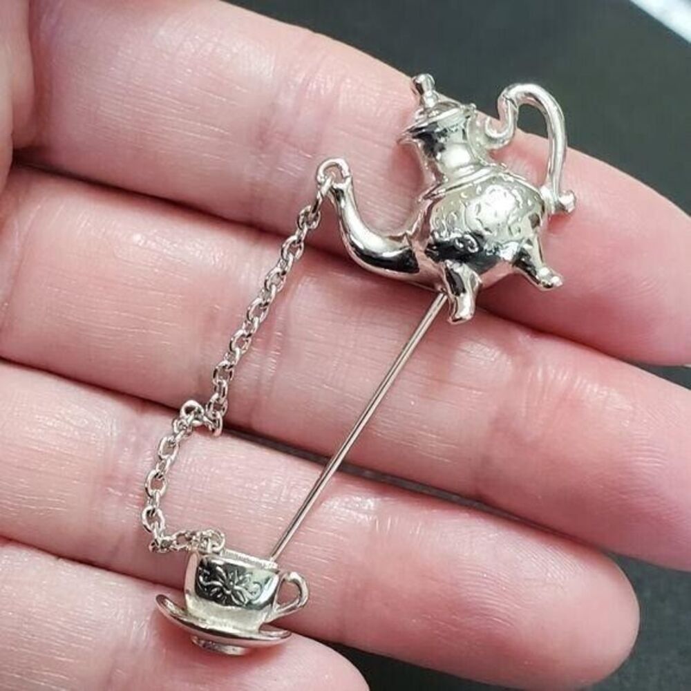 Avon silver tone teapot and cup brooch